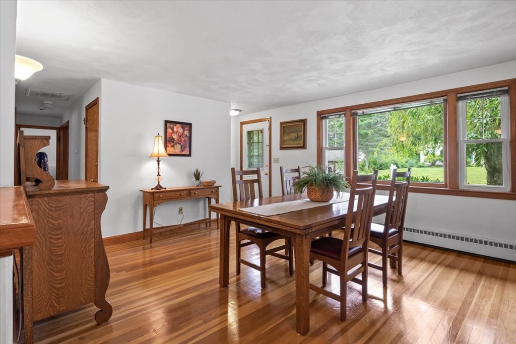 23 Old Post Road East Walpole, MA 02032 - Photo 3 of 27 a view of a dining room with furniture window and wooden floor