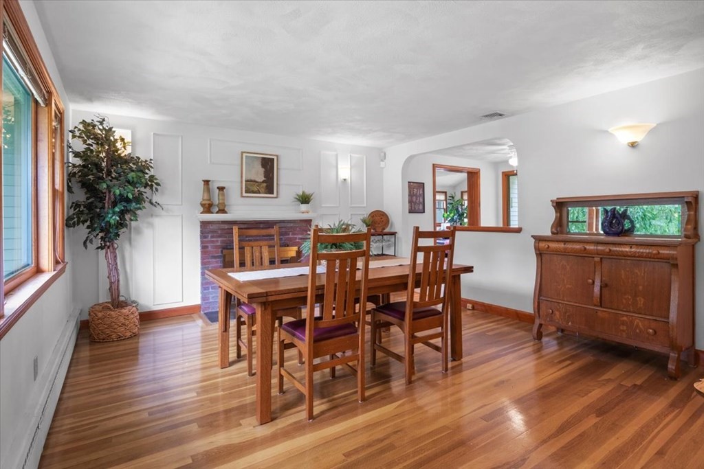 23 Old Post Road East Walpole, MA 02032 - Photo 5 of 27 a view of a dining room with furniture and wooden floor
