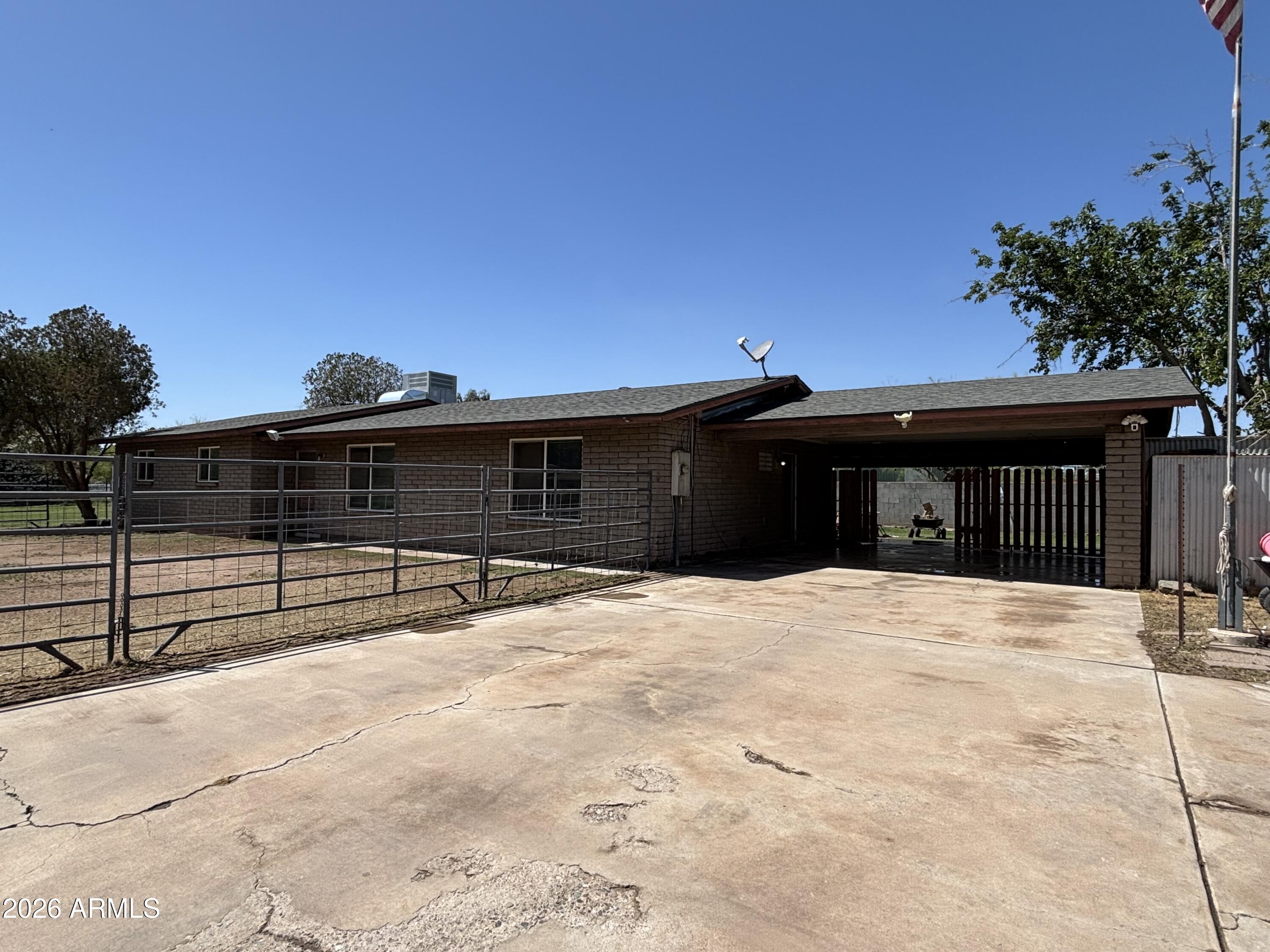 6508 West Fremont Road Laveen, AZ 85339 - Photo 2 of 32 a view of house with outdoor space and yard