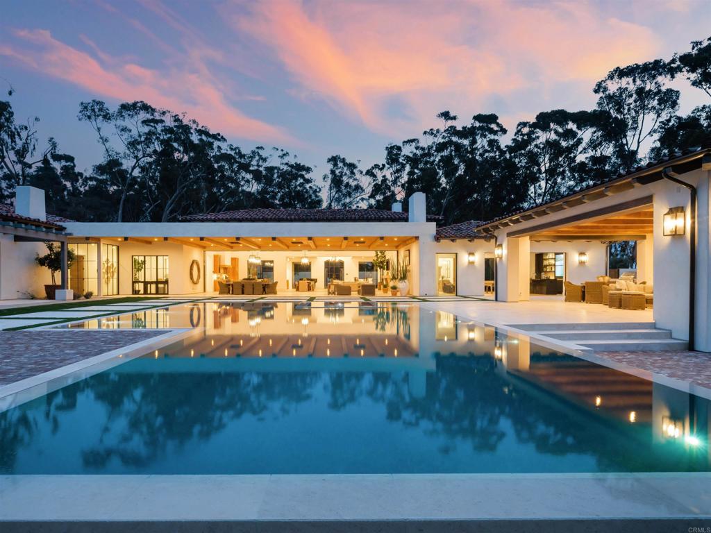 15250 Las Planideras Rancho Santa Fe, CA 92067 - Photo 1 of 1 a view of swimming pool with outdoor seating and yard in back