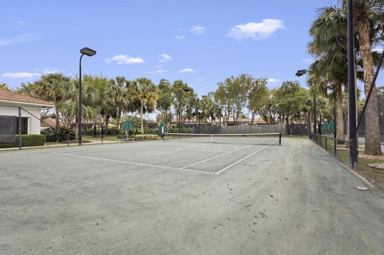 14841 Strand Lane, Unit 14841 Delray Beach, FL 33446 - Photo 41 of 43 a view of a playground with basketball court