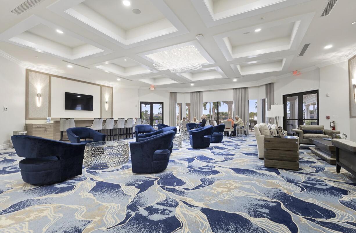 14841 Strand Lane, Unit 14841 Delray Beach, FL 33446 - Photo 43 of 43 a living room with furniture or couch and a flat screen tv