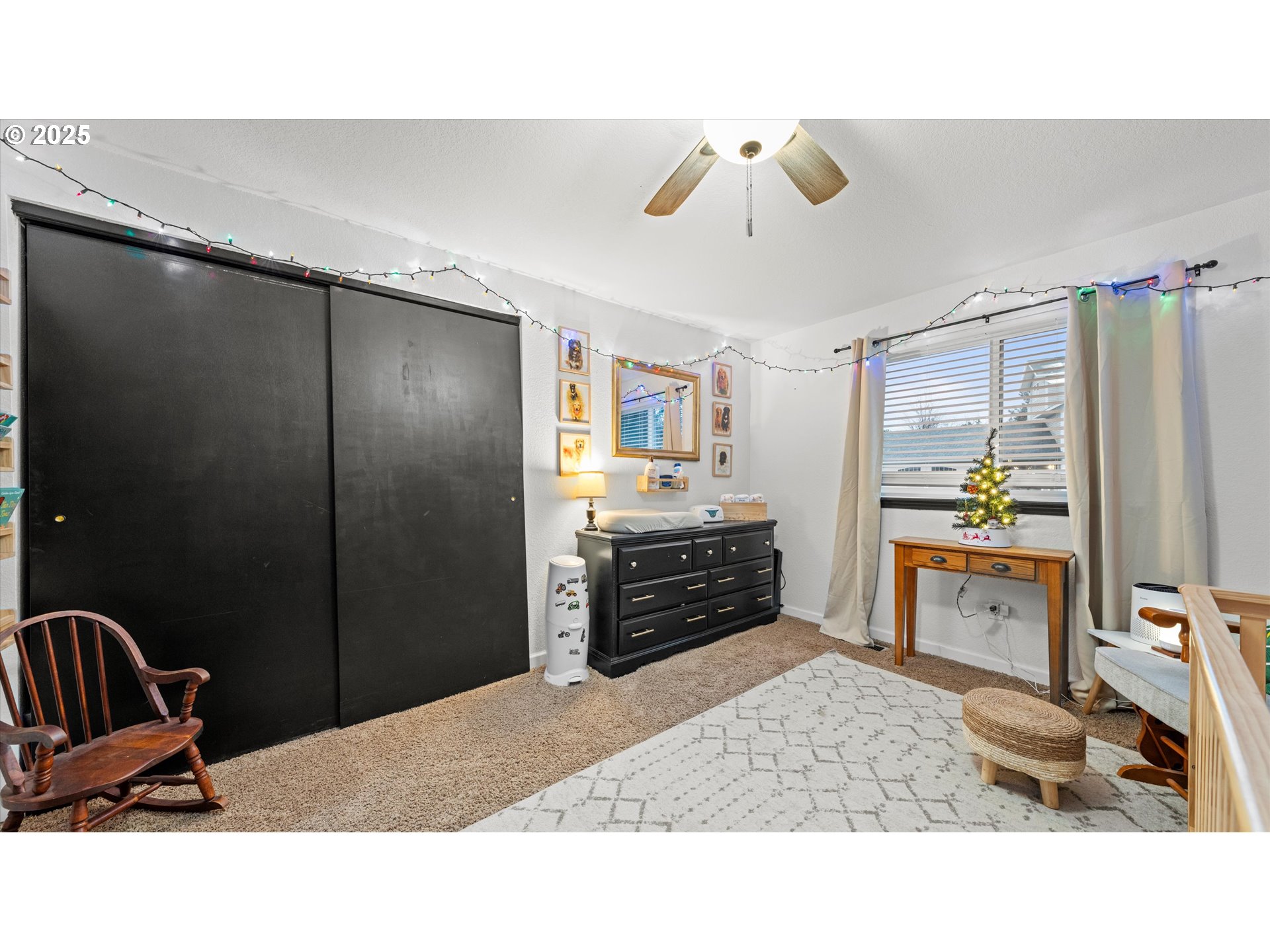 370 Southeast 9th Drive Hermiston, OR 97838 - Photo 24 of 31 a kitchen with a refrigerator and cabinets