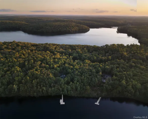 a view of a lake in middle of the house