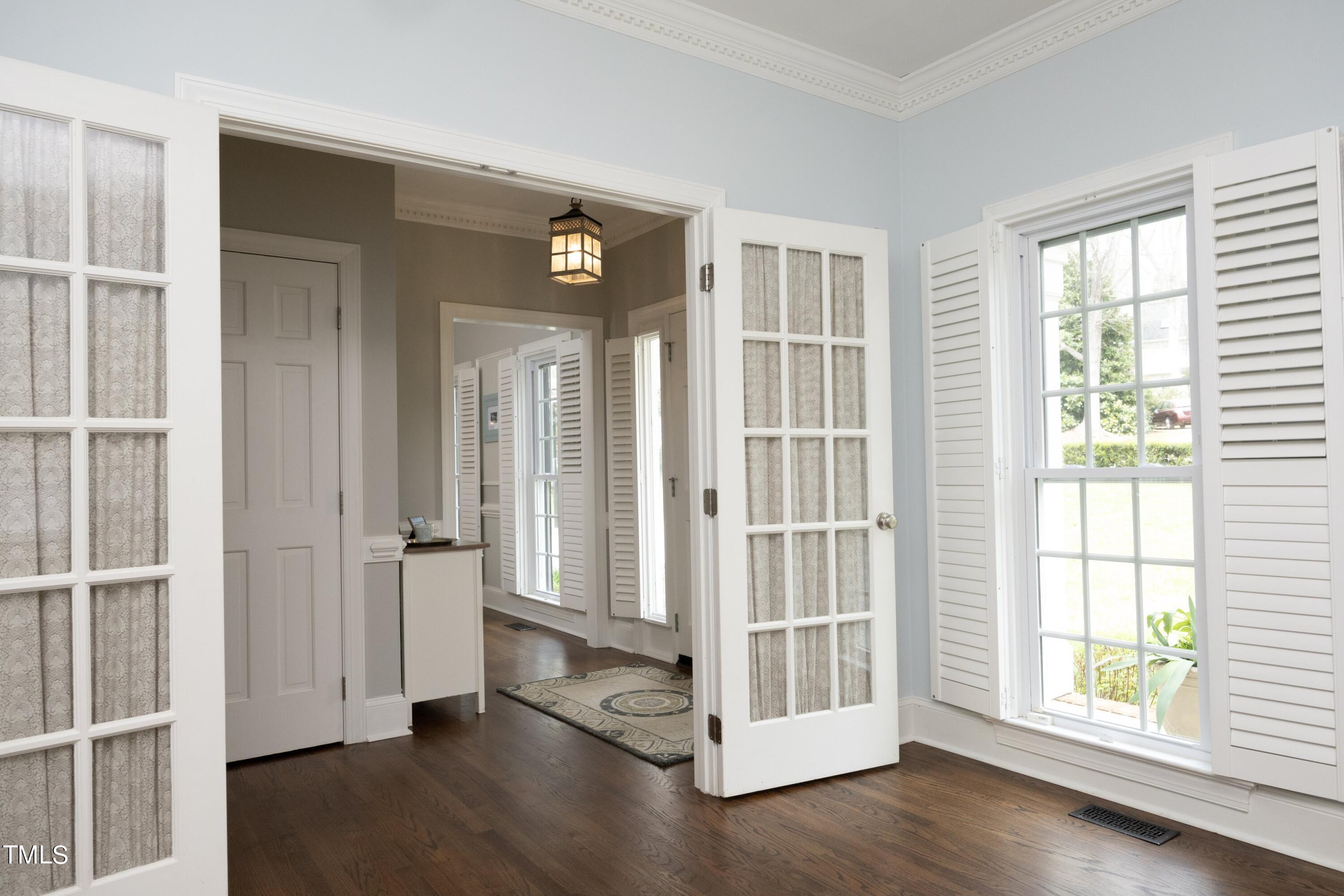 4009 Lake Springs Court Raleigh, NC 27613 - Photo 7 of 46 7FrontRoomDoors