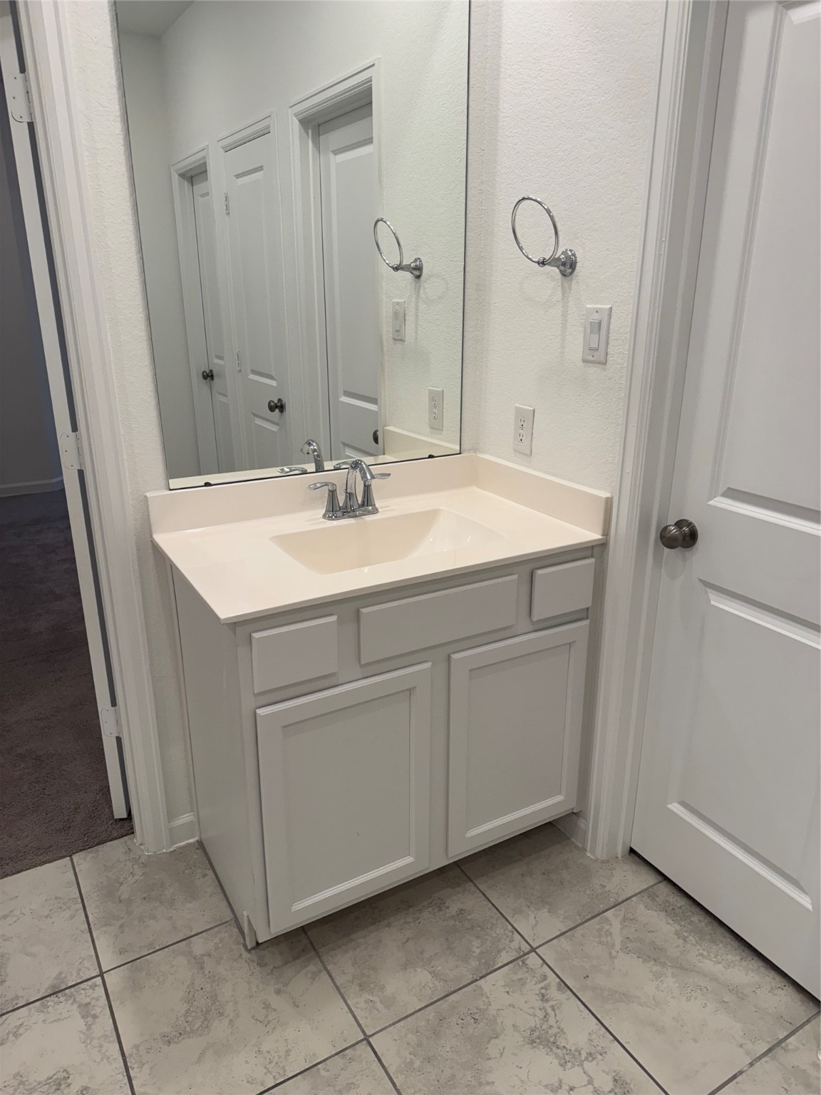2911 Cooper Hawk Lane Richmond, TX 77406 - Photo 14 of 27 a bathroom with a sink and a mirror