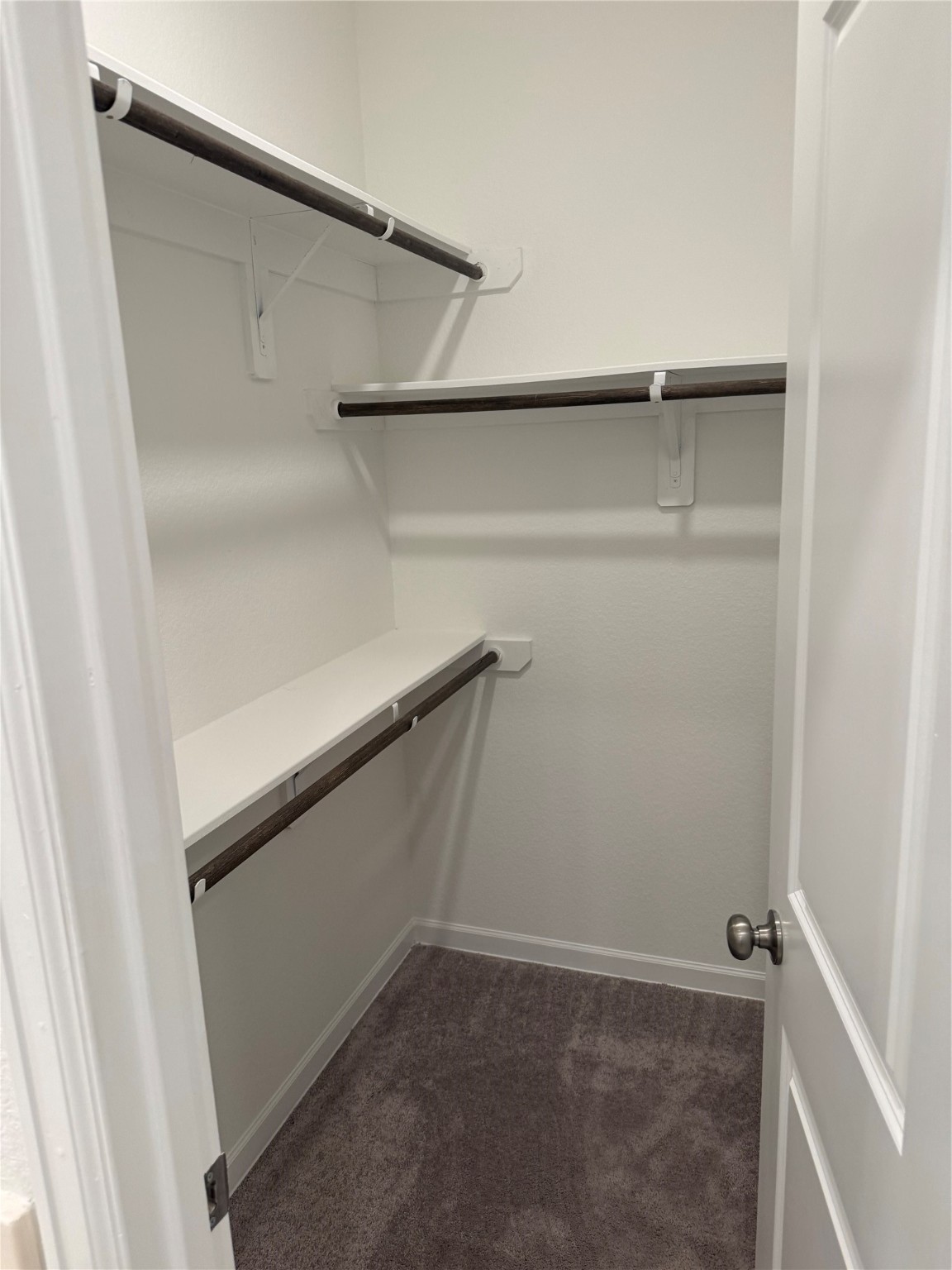 2911 Cooper Hawk Lane Richmond, TX 77406 - Photo 16 of 27 a view of walk in closet