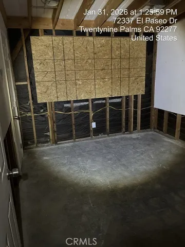 a view of a room with wooden walls