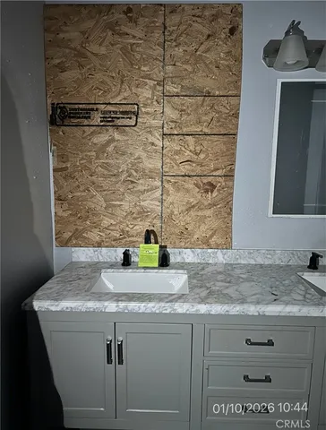 a close view of sink and mirror