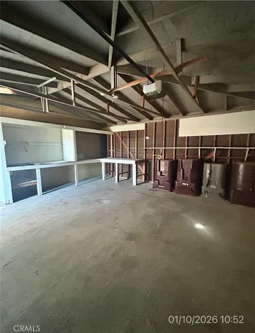 a view of a room with wooden racks