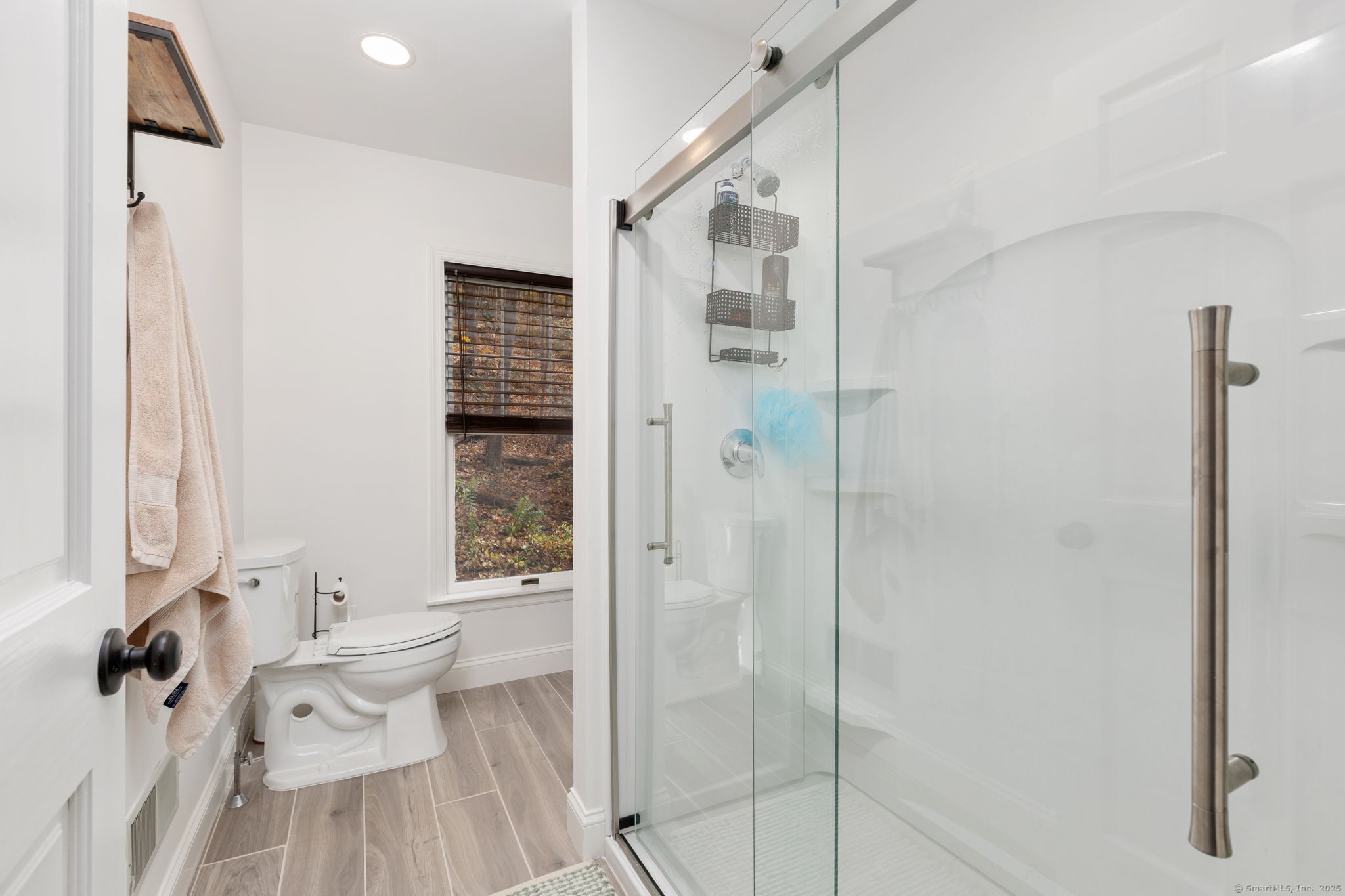 17 Curtis Drive Sherman, CT 06784 - Photo 11 of 34 a bathroom with a bathtub shower sink and toilet