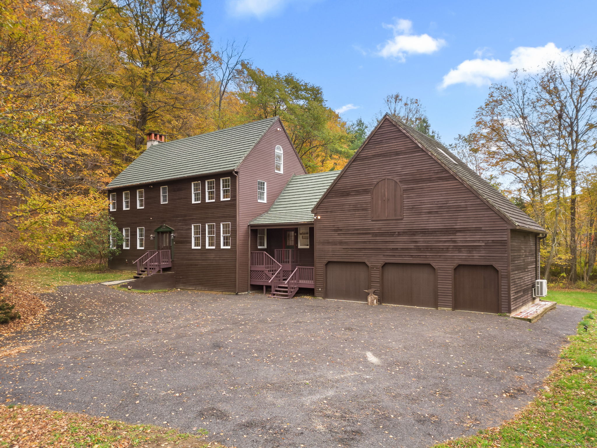 17 Curtis Drive Sherman, CT 06784 - Photo 2 of 34 a view of a house with a yard and garage