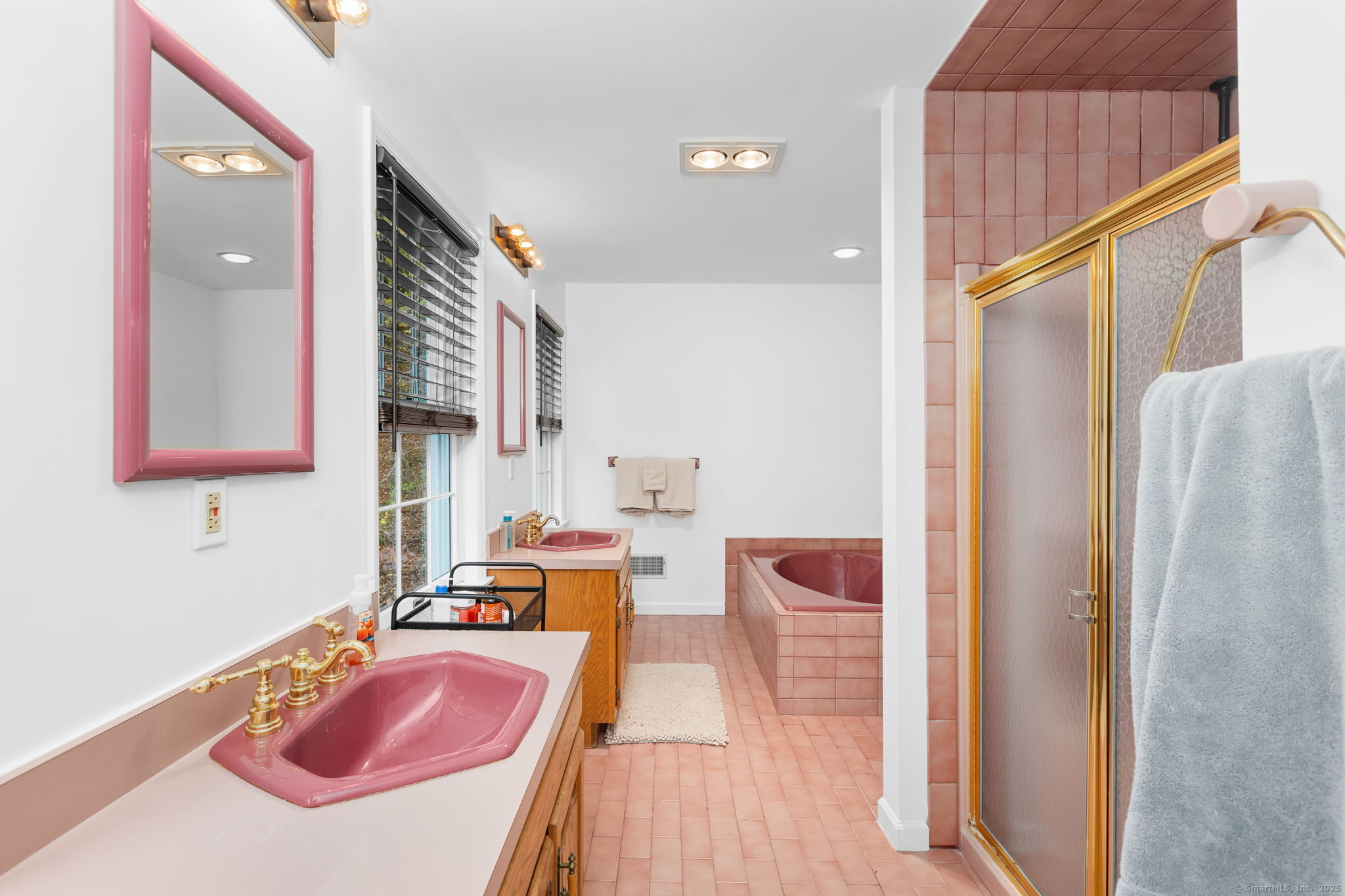 17 Curtis Drive Sherman, CT 06784 - Photo 21 of 34 a bathroom with a sink and a mirror