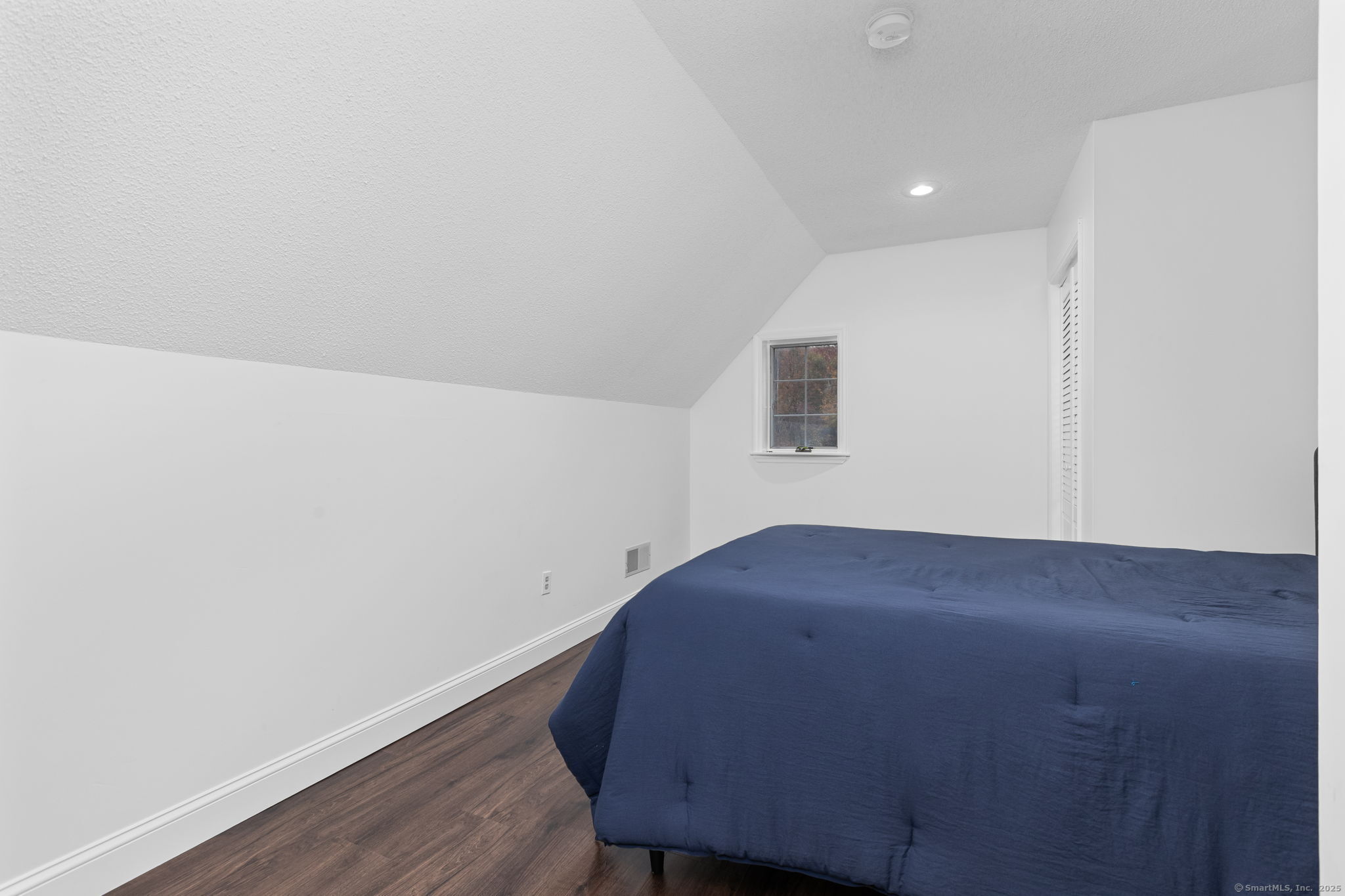 17 Curtis Drive Sherman, CT 06784 - Photo 22 of 34 a view of empty room with wooden floor and fan