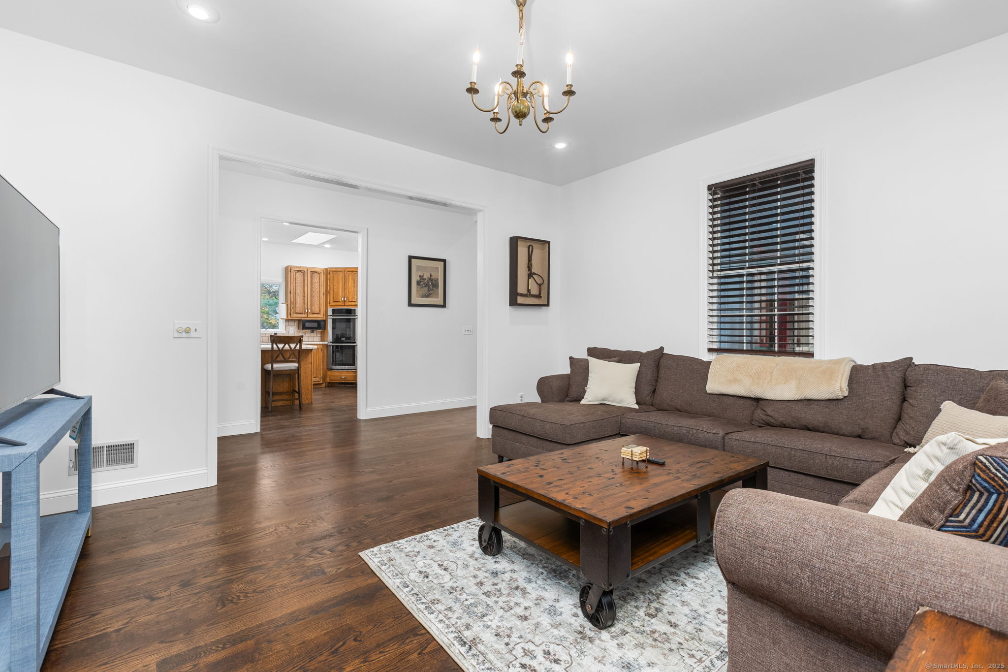 17 Curtis Drive Sherman, CT 06784 - Photo 5 of 34 a living room with furniture and a window