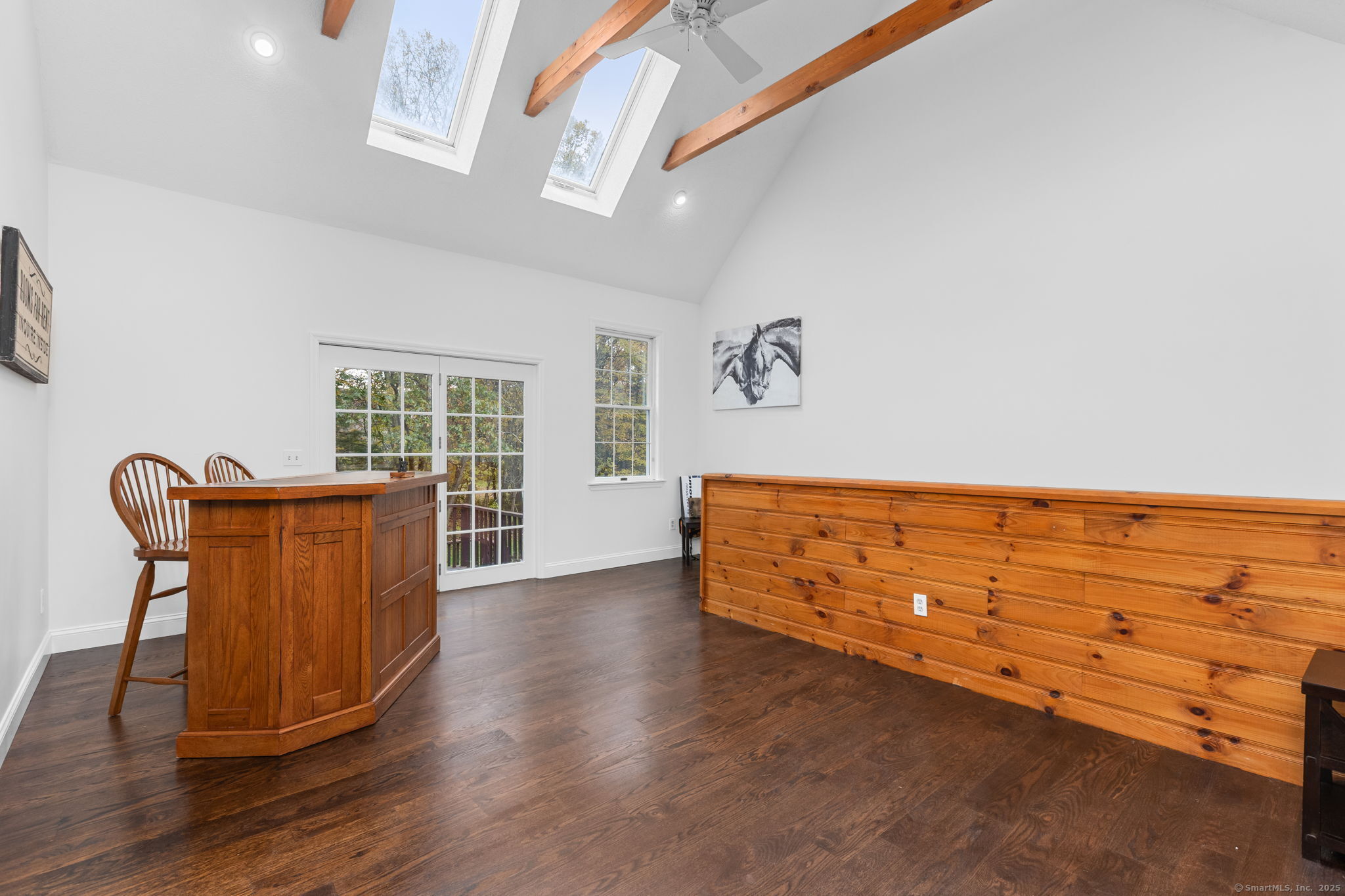 17 Curtis Drive Sherman, CT 06784 - Photo 7 of 34 a view of a room with wooden floor cabinet and windows