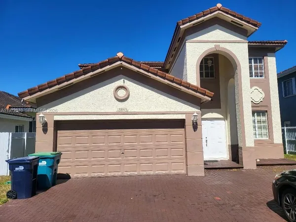 a house view with a outdoor space