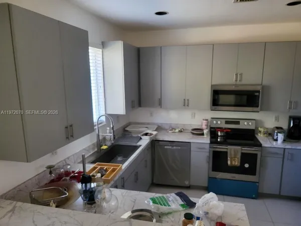 a view of a livingroom with furniture