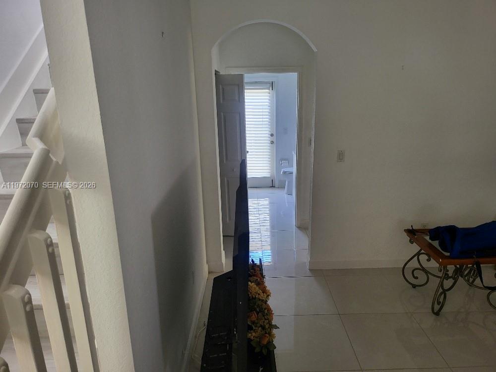 15843 Southwest 139th Street Miami, FL 33196 - Photo 21 of 39 a view of hallway with furniture and a table