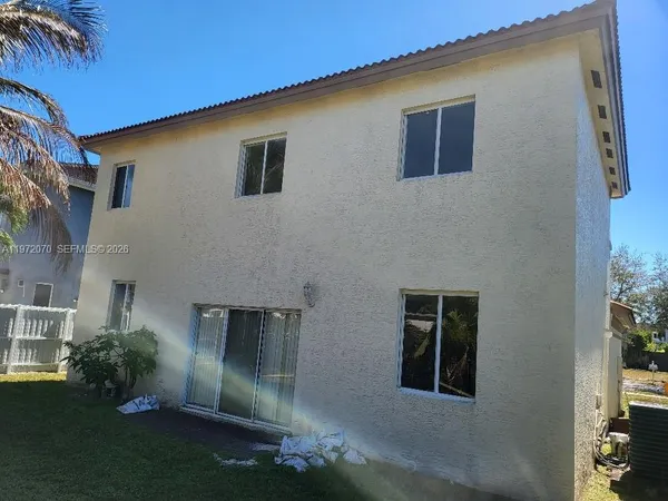 a view of front of house with a street