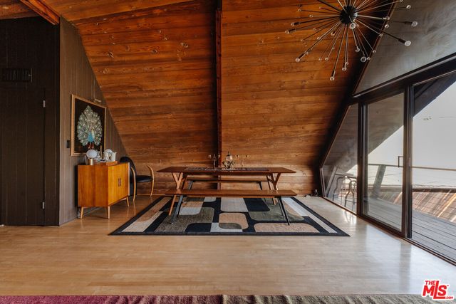 a view of a hallway with washer and dryer