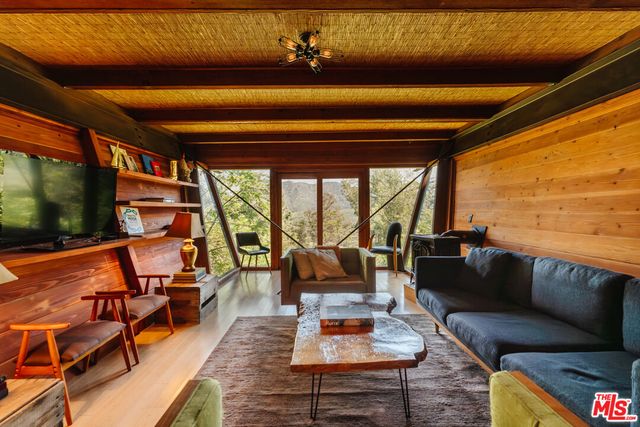 a backyard of a house with seating space