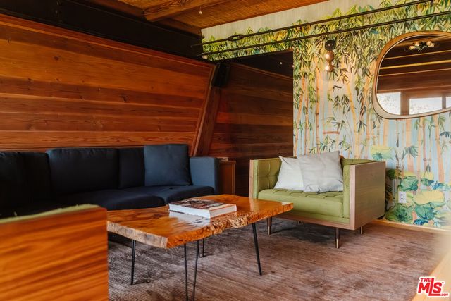 a bed room with a bed and a window