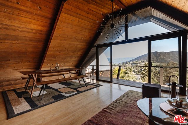 a porch with wooden floor