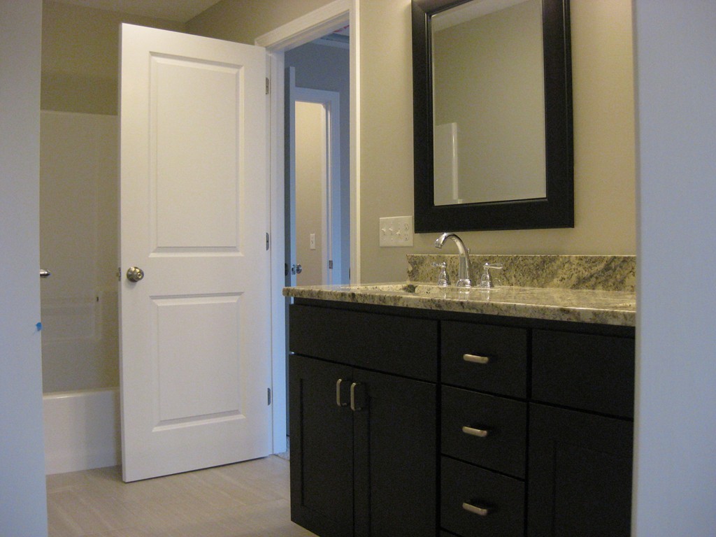20 Old Lane Road Springfield, MA 01129 - Photo 8 of 17 a bathroom with a sink and a mirror