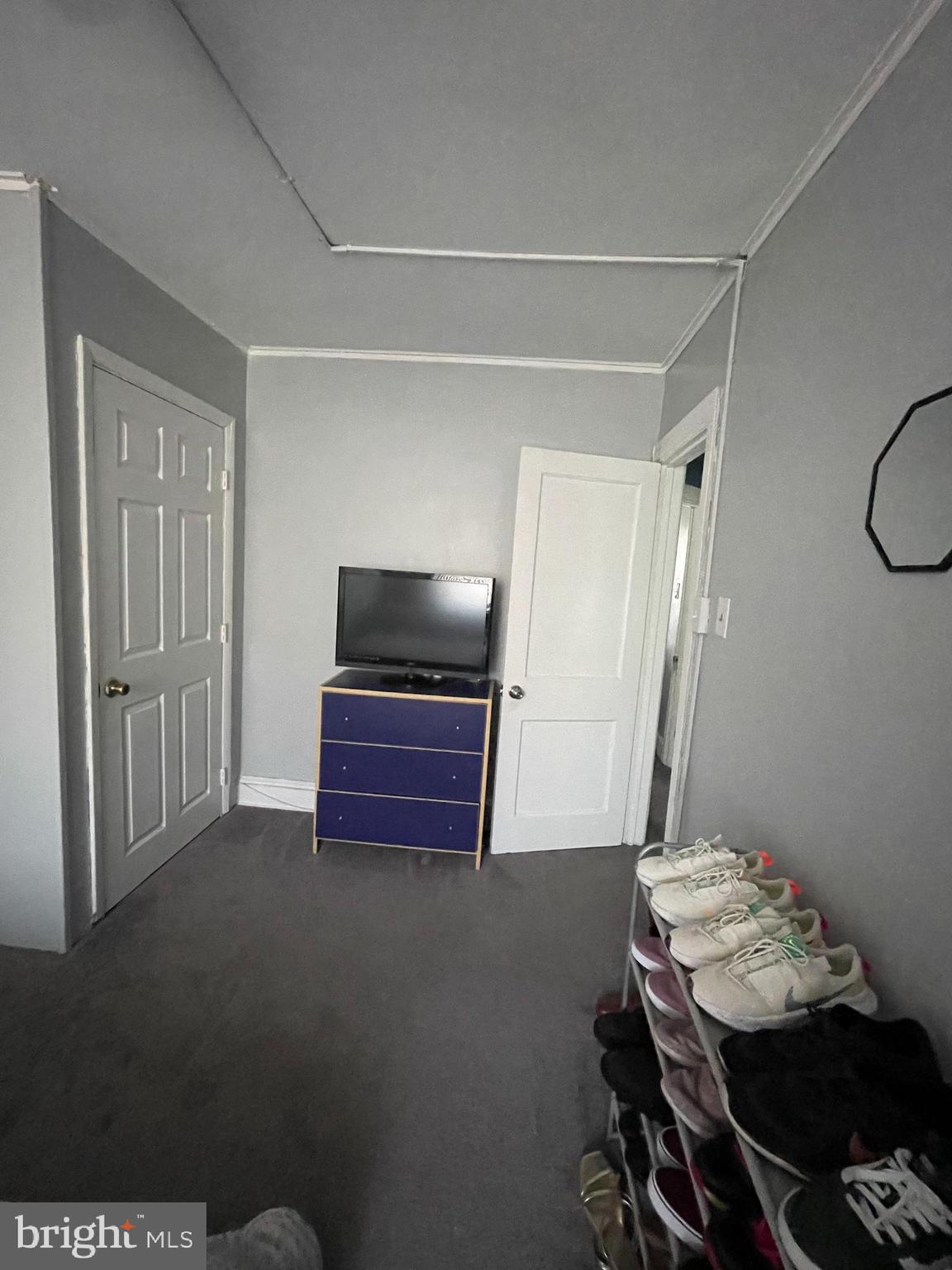 5452 Euclid Street Philadelphia, PA 19131 - Photo 11 of 22 a room with furniture and a flat screen tv