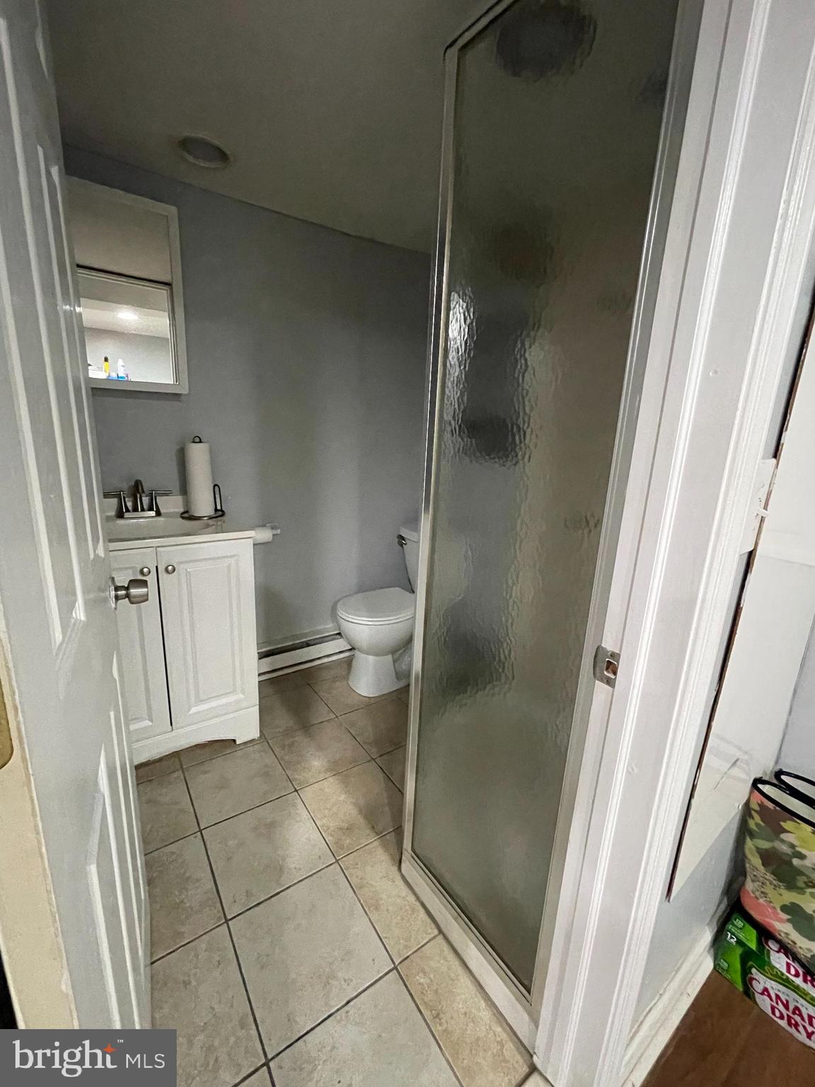 5452 Euclid Street Philadelphia, PA 19131 - Photo 19 of 22 a bathroom with a toilet and a shower