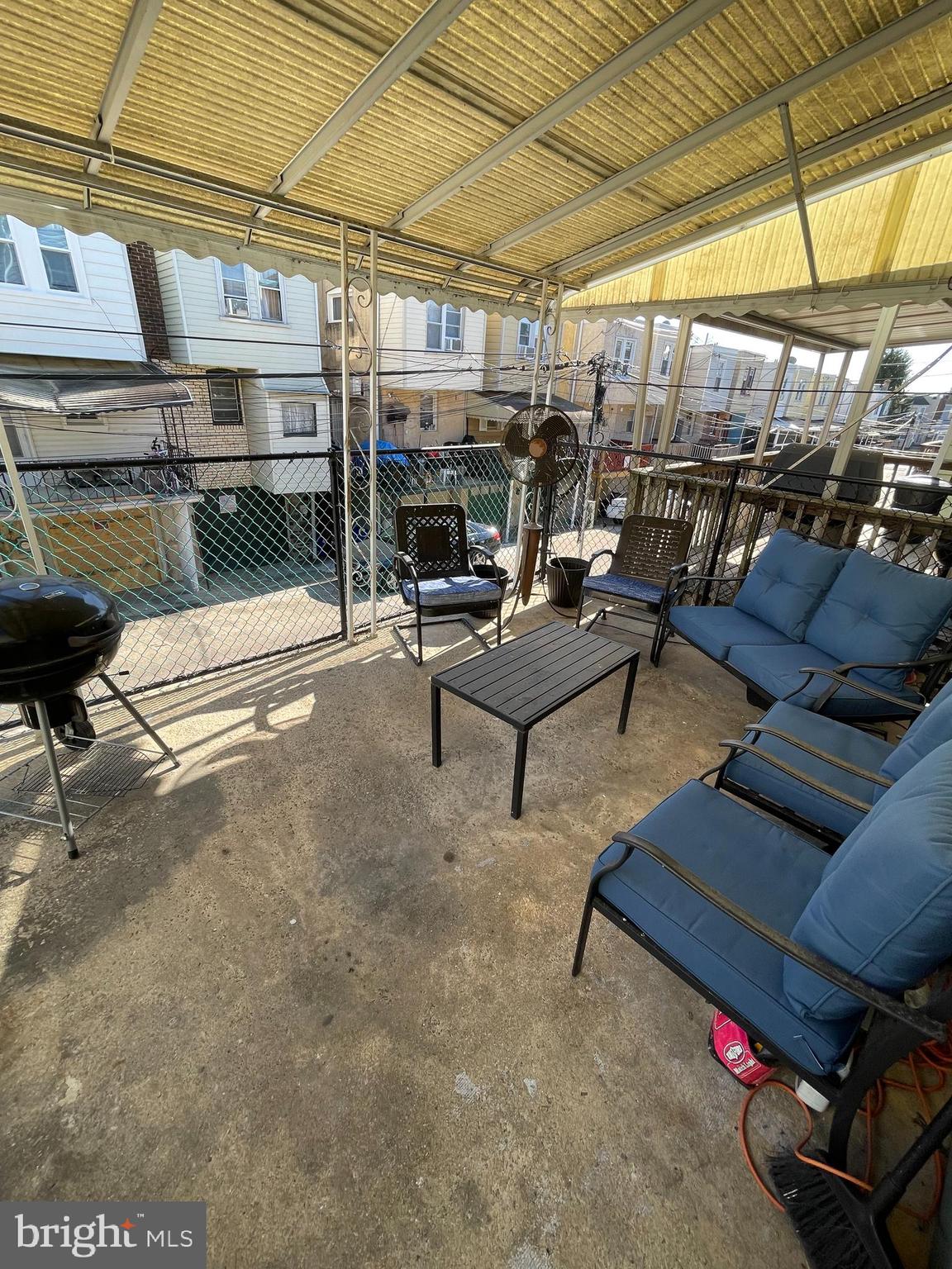 5452 Euclid Street Philadelphia, PA 19131 - Photo 7 of 22 a view of a chairs and table in the patio