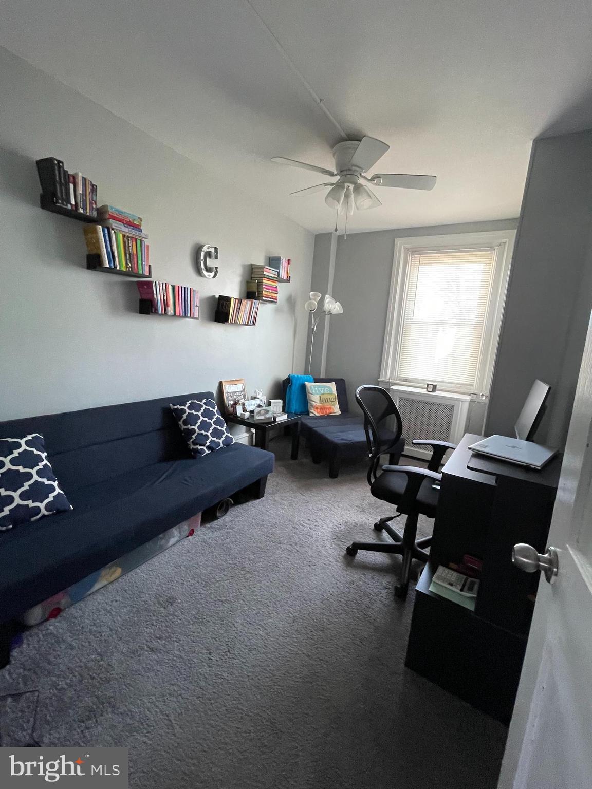 5452 Euclid Street Philadelphia, PA 19131 - Photo 9 of 22 a living room with furniture rug and window
