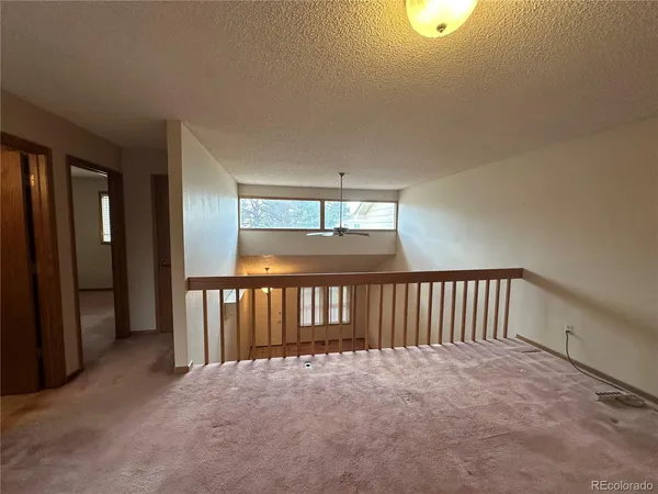 a view of hallway with livingroom