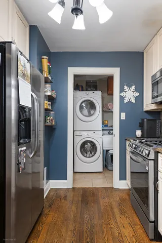 a kitchen with a stove and a refrigerator