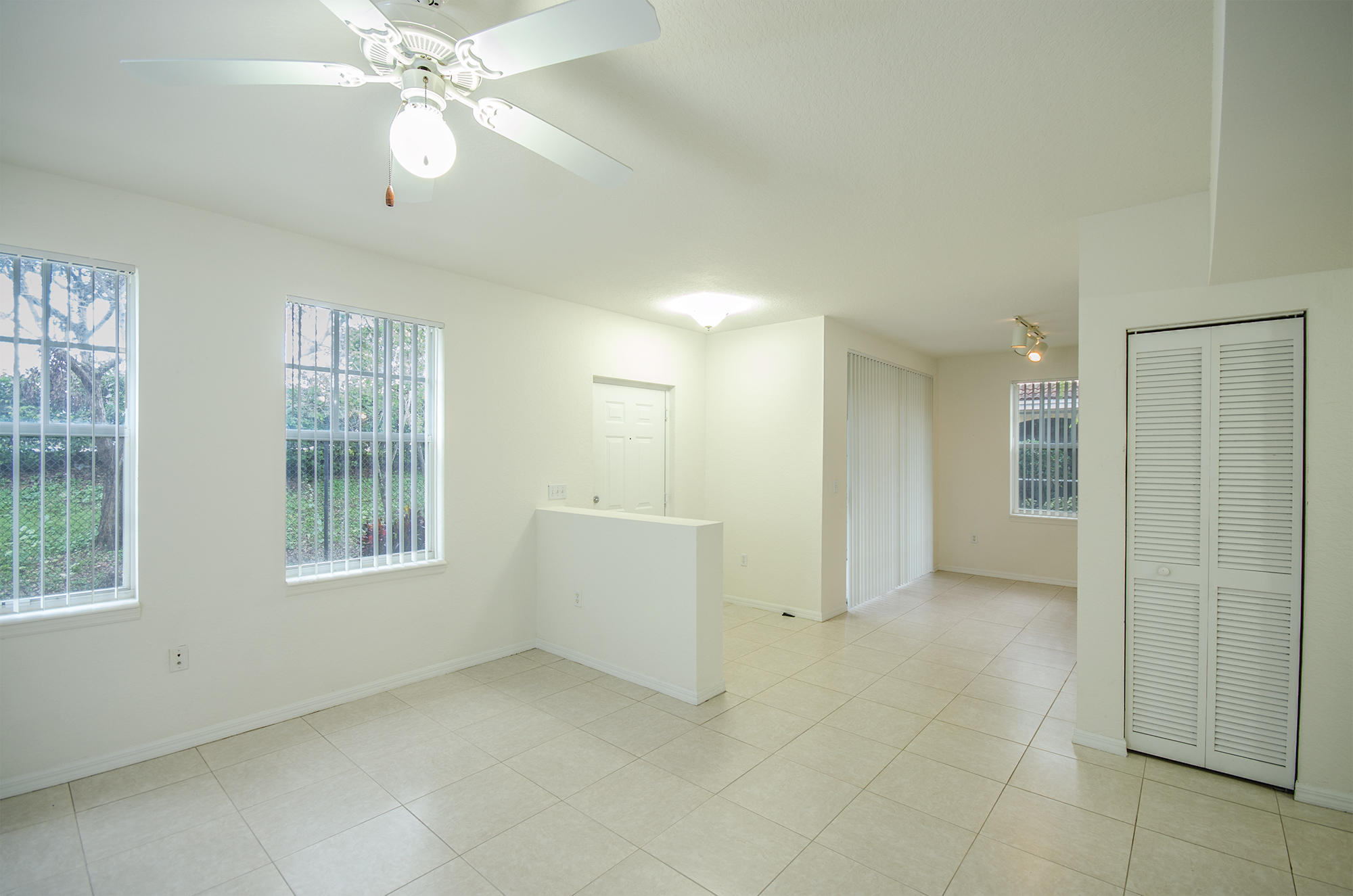 6324 West Sample Road, Unit 6324 Coral Springs, FL 33067 - Photo 4 of 27 living and dining areas