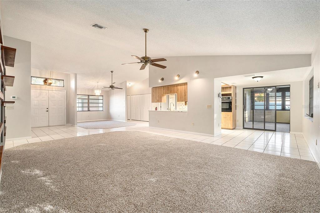 7320 Auburn Lane New Port Richey, FL 34654 - Photo 11 of 28 a view of a kitchen with a sink and refrigerator