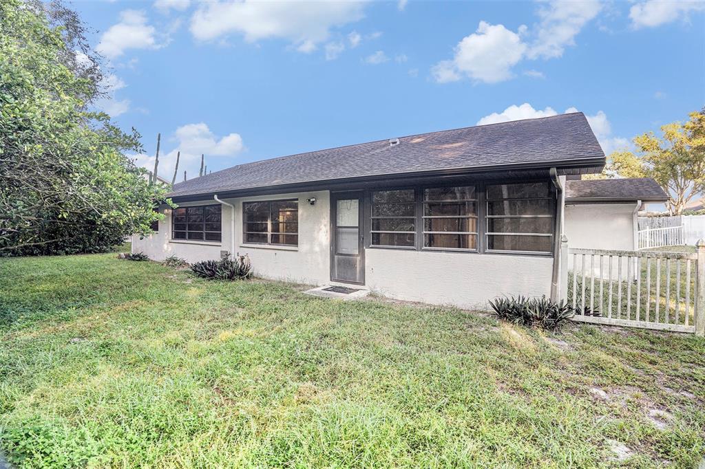 7320 Auburn Lane New Port Richey, FL 34654 - Photo 26 of 28 a house view with a garden space