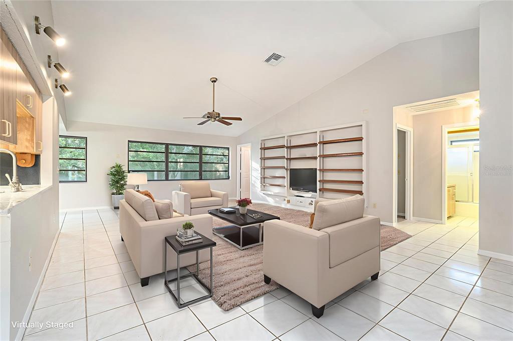 7320 Auburn Lane New Port Richey, FL 34654 - Photo 4 of 28 a living room with furniture and large windows