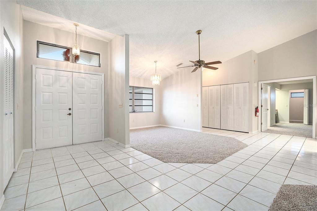 7320 Auburn Lane New Port Richey, FL 34654 - Photo 7 of 28 a view of a livingroom with a bathroom