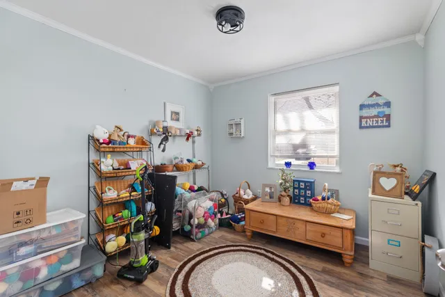 a bed room with a bed and a window