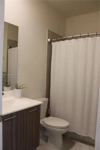 a bathroom with a sink and a toilet