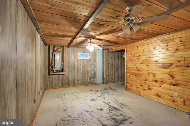 a view of a porch with wooden floor and stairs