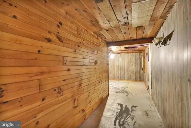 a view of a two chairs in the balcony