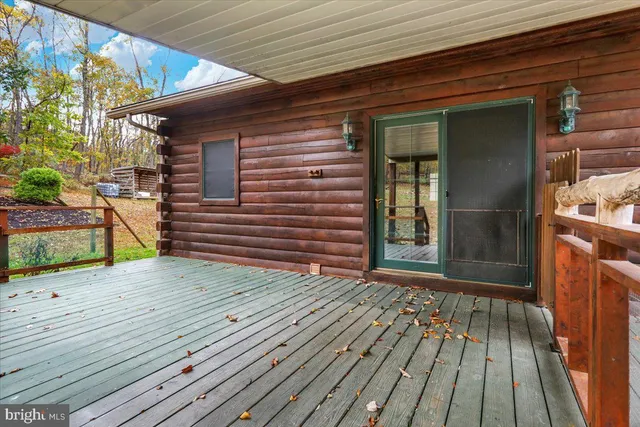 a view of a chairs and tables in the balcony