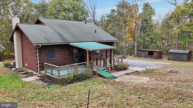a bathroom with a shower and a mirror