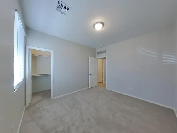 an empty room with window