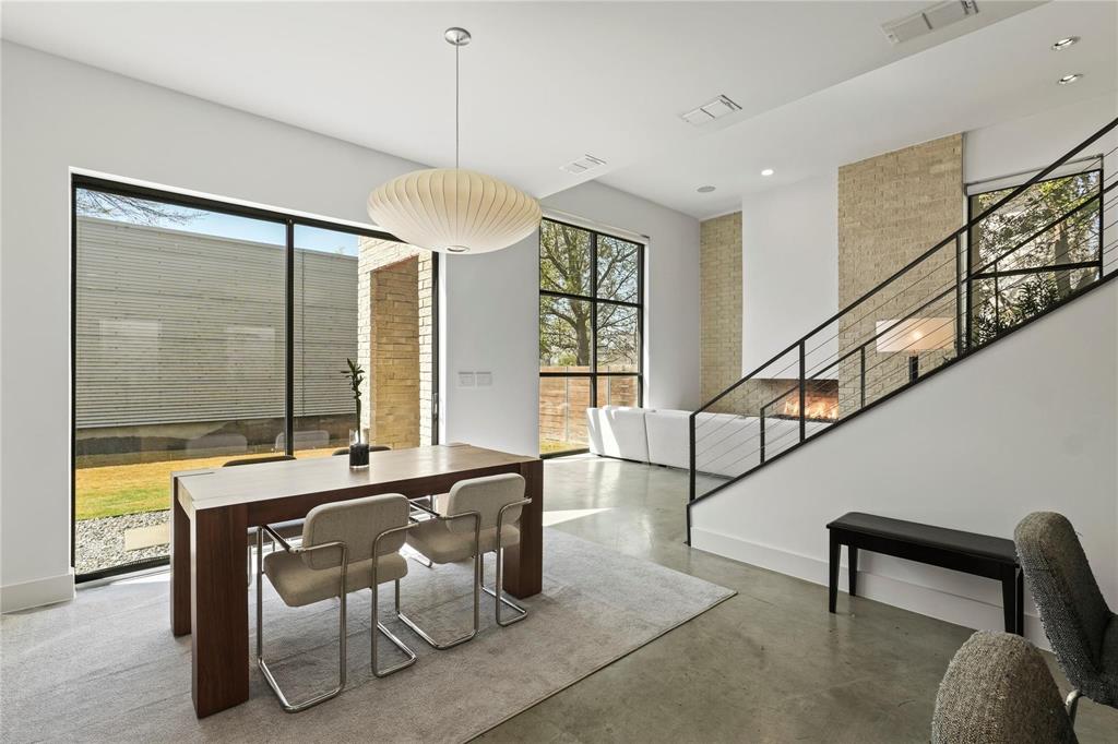 6 Vanguard Way Dallas, TX 75243 - Photo 14 of 35 a view of entryway and hall with dining area