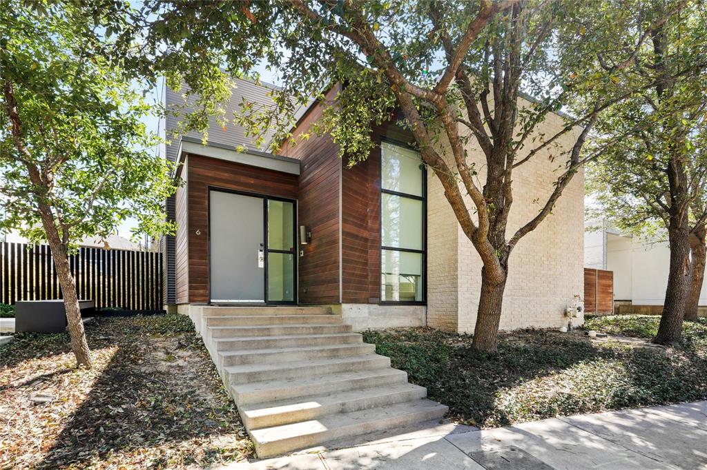 6 Vanguard Way Dallas, TX 75243 - Photo 2 of 35 a front view of a house with garden