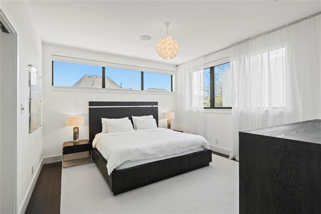 6 Vanguard Way Dallas, TX 75243 - Photo 24 of 35 a bedroom with a bed and a window